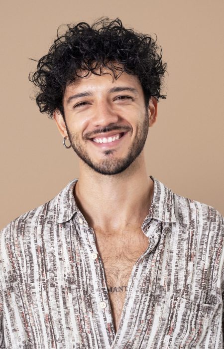 Latin man smiling cheerful expression closeup portrait